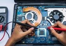 Laptop motherboard repair in progress at Luminoux Technologies